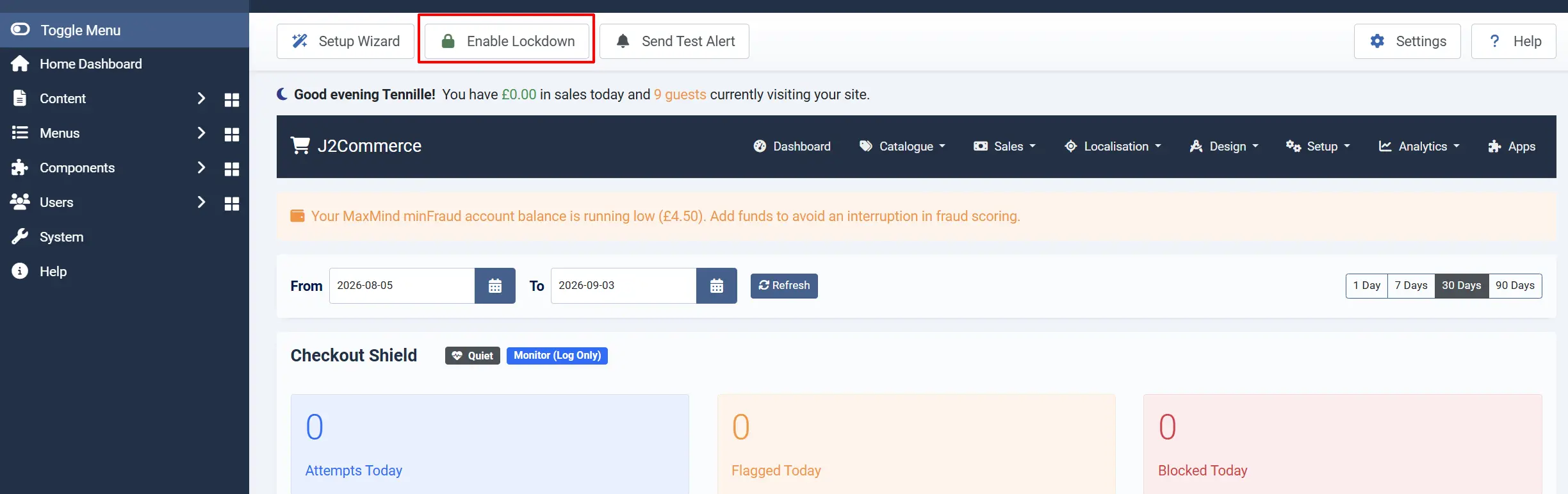 Checkout Shield dashboard toolbar with the Enable Lockdown button highlighted next to Setup Wizard and Send Test Alert, above a low minFraud balance warning